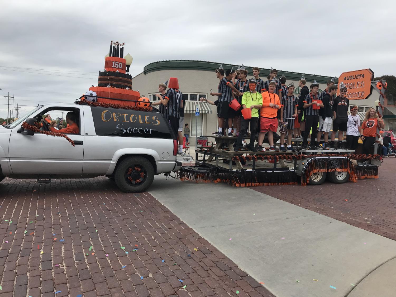 Oriole spirit soars over cold, rainy day