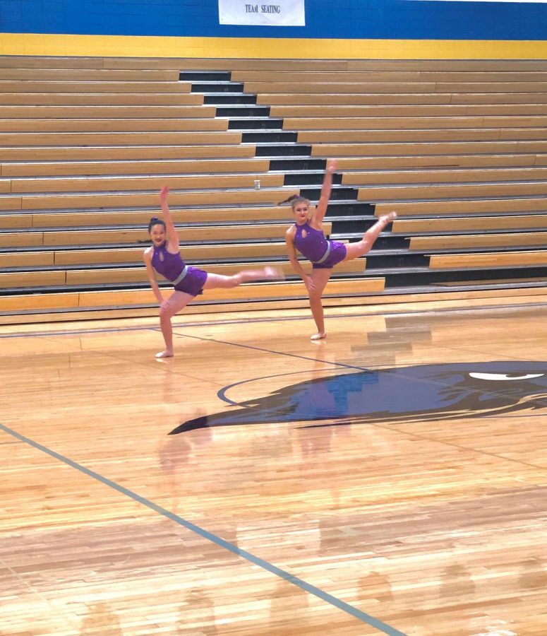 Kenzie Childers (11) and Maddie Ray (11) perform a duet at the State Dance Competition. The competition was pushed back two days due to inclement weather in the Kansas City area.
