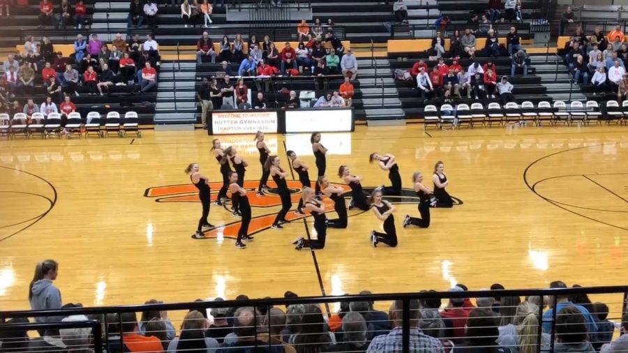 The+Oriolettes+perform+during+halftime+of+the+boys+varsity+game+Jan.+8.+The+Oriolettes+will+perform+at+state+dance+competition+Jan.+18-19+in+Olathe+East+High+School.