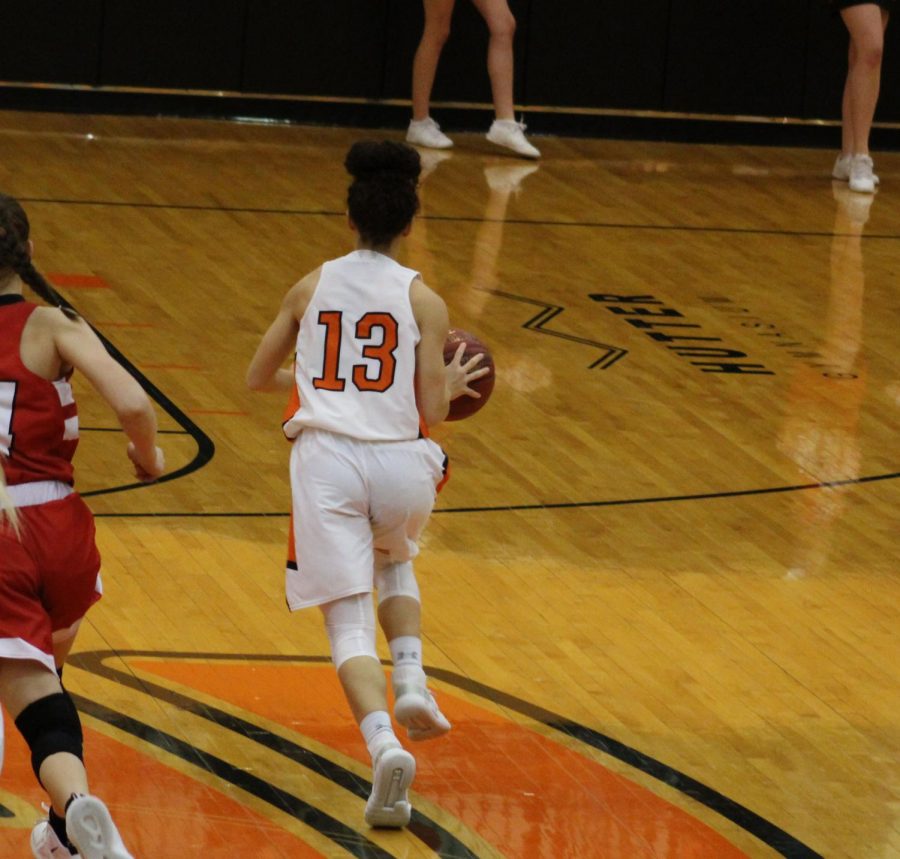 Maycee Anderson (10) takes the ball down the court. The Orioles defeated Rose Hill Feb. 1 at home.
