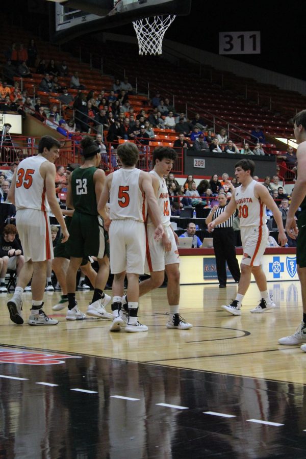 The Orioles take place on the floor to start the semi-final game. Head boys basketball coach Jake Sims lead the team to victory over Chapman.