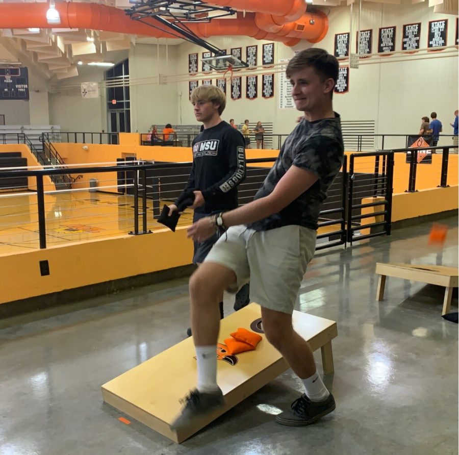 Senior Noah Coldwell September 12. He is competing in the AHS cornhole tournament. 