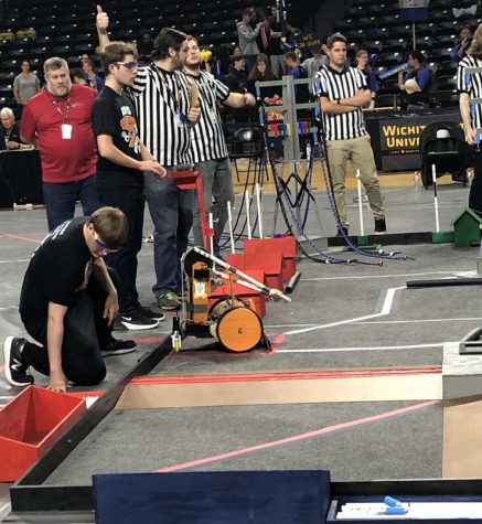 During the B.E.S.T. Robotics regionals at Wichita State University, senior Forrest Tuschhoff drives the teams robot. The team placed second which allowed them to travel to Denver, Colorado for Nationals.