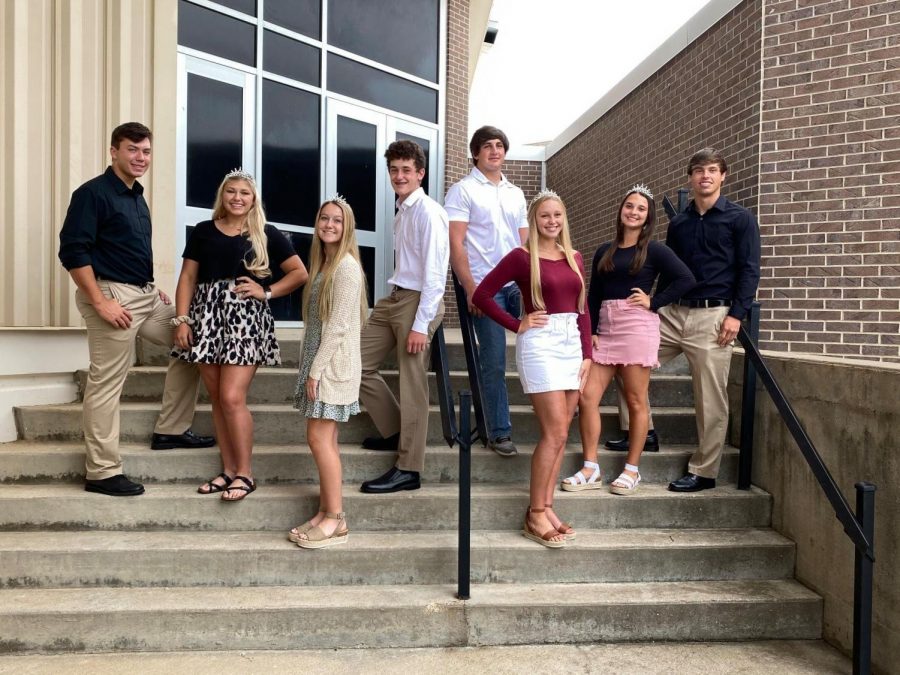 Homecoming candidates (right to left) Zack Timberlake, Morgan Pennycuff, Taylor Braungardt, Josh Manahan, Ryan Andrews, Jadyn Jackson, Payton Haskell and Duke Lichlyter stand together for a picture. King and queen will be announced Friday Oct. 2 at 6:40 p.m. before the home game against Buhler. 