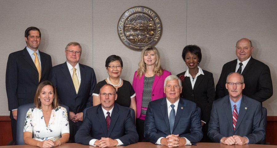 (Top row, from left to right) John Rolph, Mark Hutton, Helen Van Etten, Shellaine Kiblinger, Cheryl Harrison-Lee, and Allen Schmidt. (Bottom row, from left to right) In the bottom left we have Ann Brandau-Murguia, Shane Bangerter, Bill Feuerborn, and Blake Flanders. Photo Credit Kansas Board of Regents Facebook Page. 