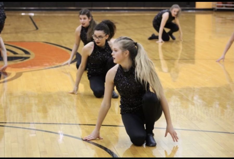 During the 2020 winter dance season, sophomore Lana Wood and junior Trinity Tisdale preform with the dance team in Hutter Gym. Both girls tried out for the 2021-2022 Oriolettes. 