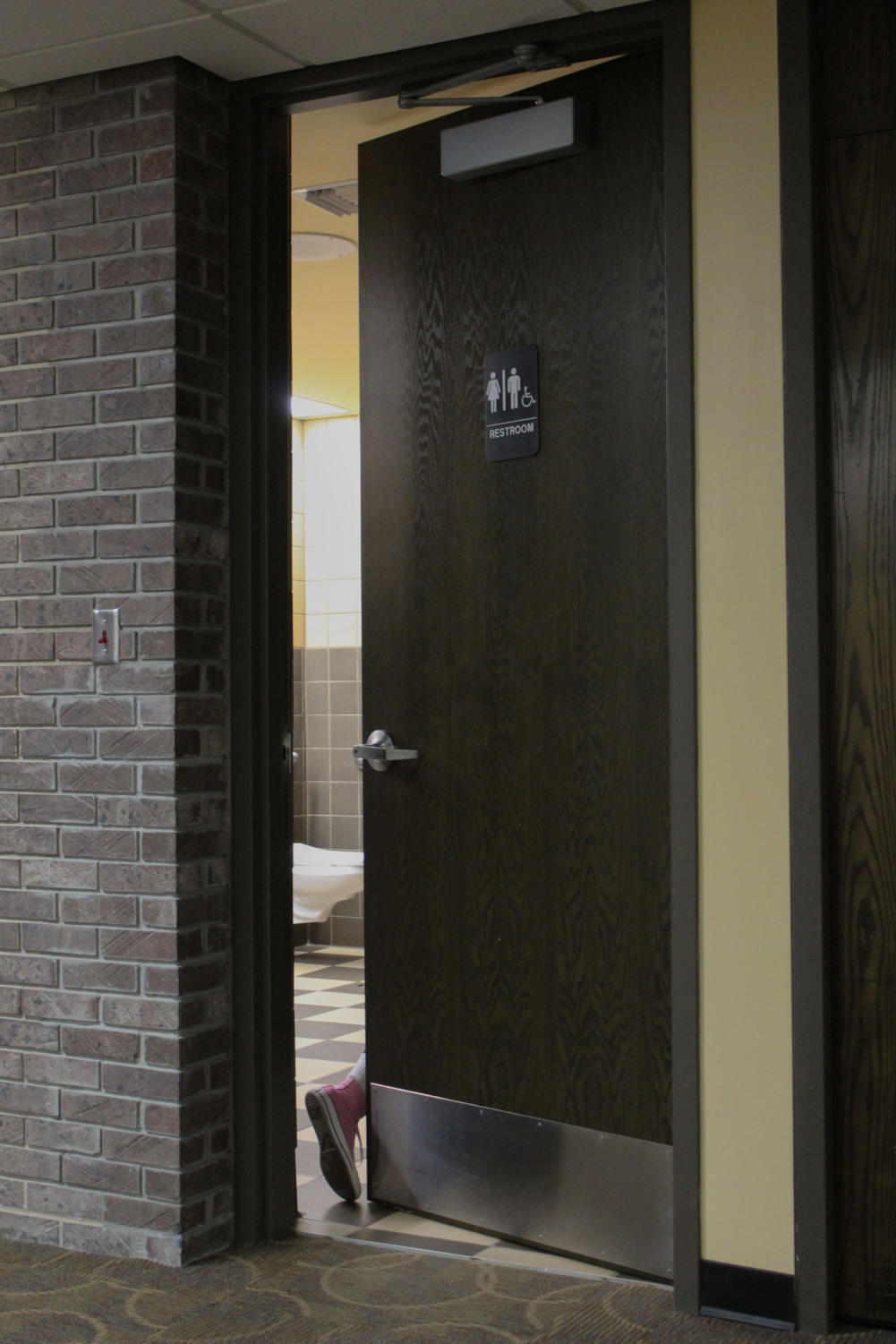 For a bathroom to be gender neutral, it must relate to or be intended for any gender. Gender neutral bathrooms have been available at the high school since August of 2021.