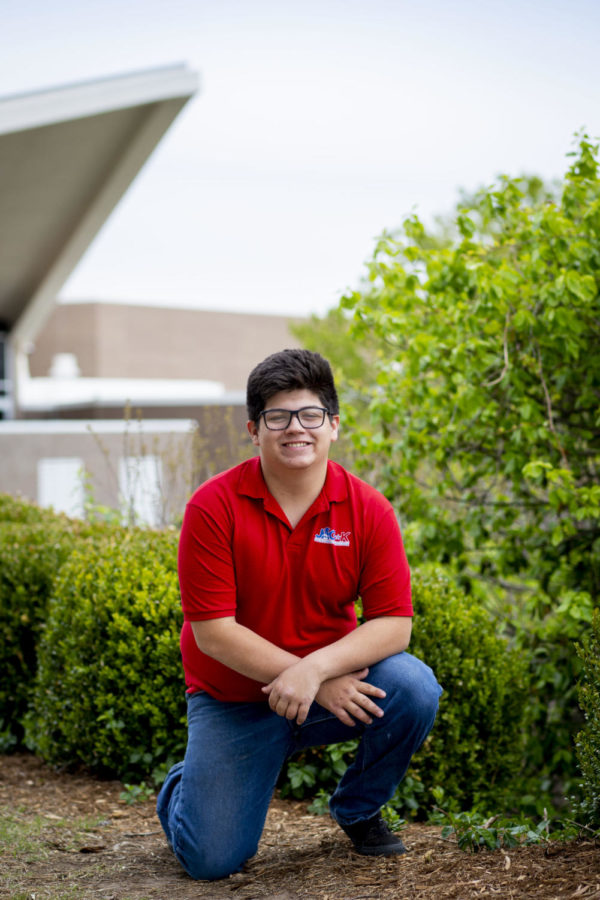 Senior Devin Russell-Unger poses for a picture in front of the school for JAG-K. “Its about your delivery and speech and thats what I did, I gave my speech from the heart to tell people that they can trust me,” Russell-Unger said.
