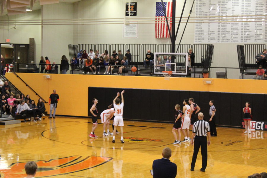 Sophomore Logan Ruddle going up for a free throw.  The JV Basketball team won against El Dorado 52-47. 