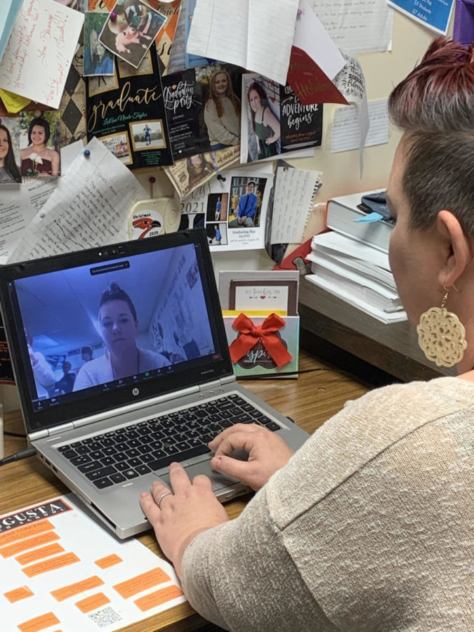 English teacher Megan Springs connects to a Zoom call for any absent students. After COVID had arose and Zoom became a normal routine for district 402, some teachers chose to continue the enforcement of Zoom calls during absence to give students the opportunity of staying on top of recently assigned work.