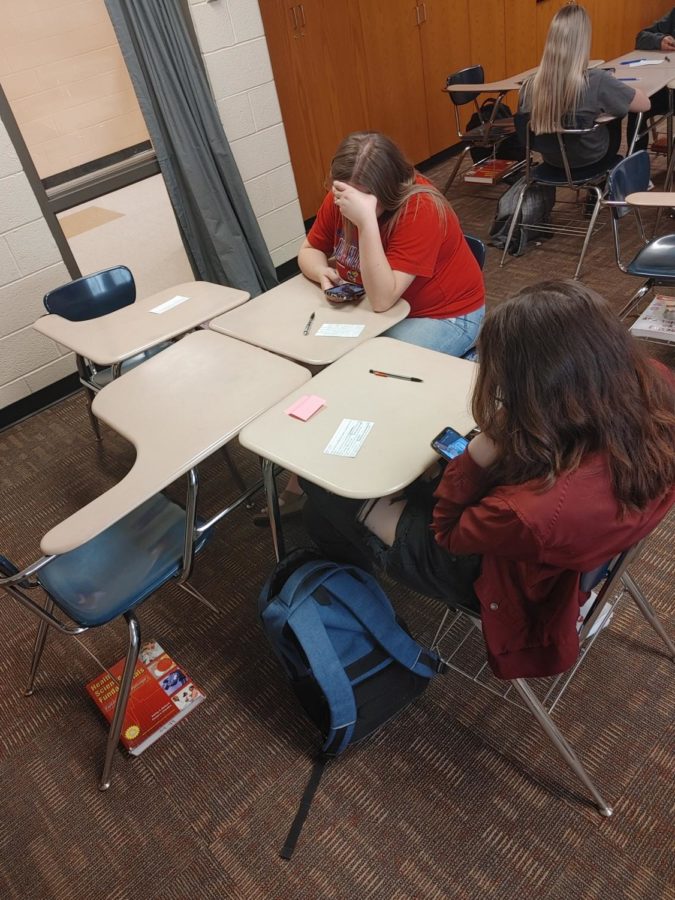 Sophomore Isabella Shafer and sophomore Trinity Logan Students sit in class feeling unmotivated. They are stressed for the end of year finals. 