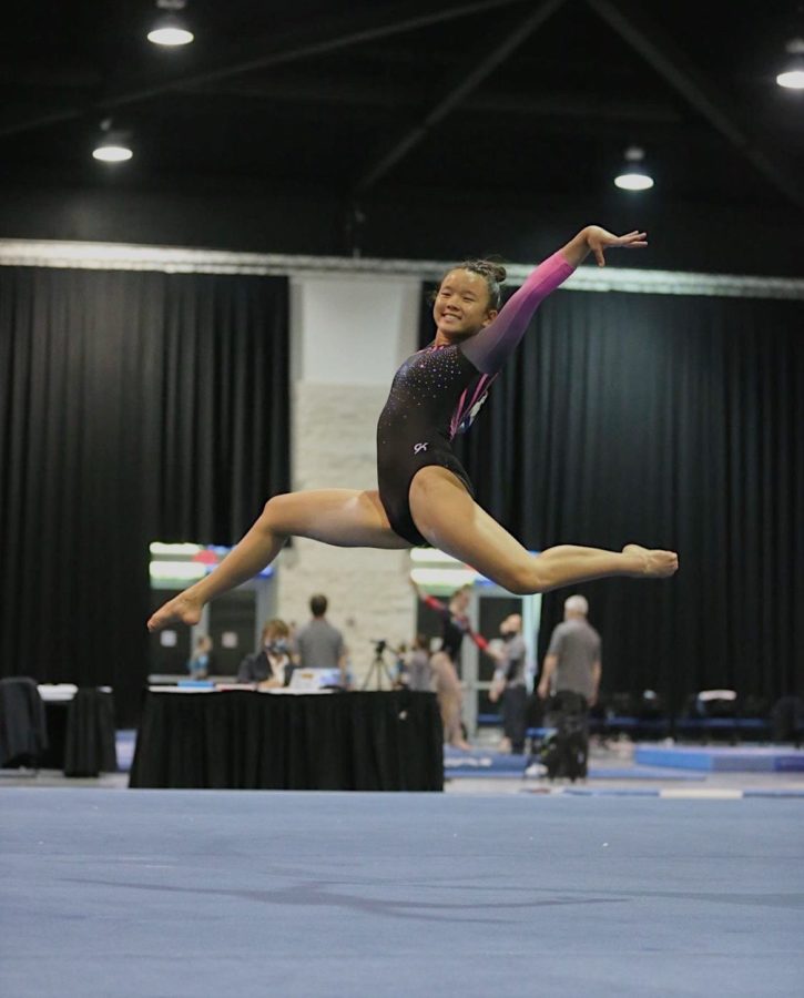 Wells leaps on her floor routine at nationals. On floor, she ended with a score of 9.700 and in 9th place. 