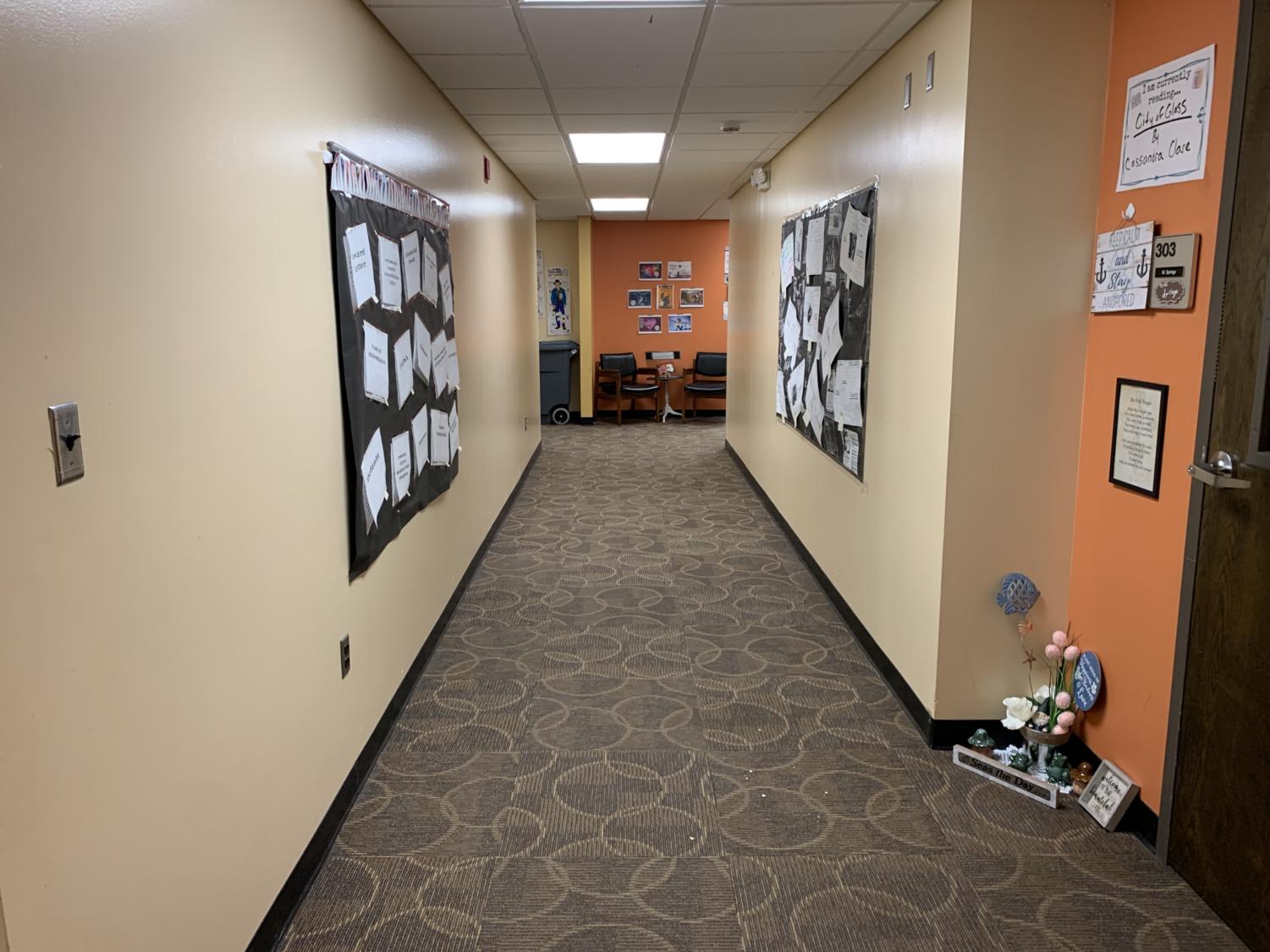 The hallway pictured is the front of  English teacher Megan Spring’s room leading to English teacher Ashley Deaver’s room. Sophomore Royce Dickinson faced a paranormal incident of his back being tugged when he was alone. 