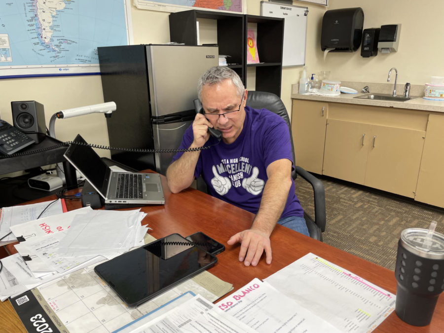 Frank Espinosa takes a phone call on his new classroom phone and is pleased with the functionality of it. He seemed to enjoy the new phones in the classroom. 