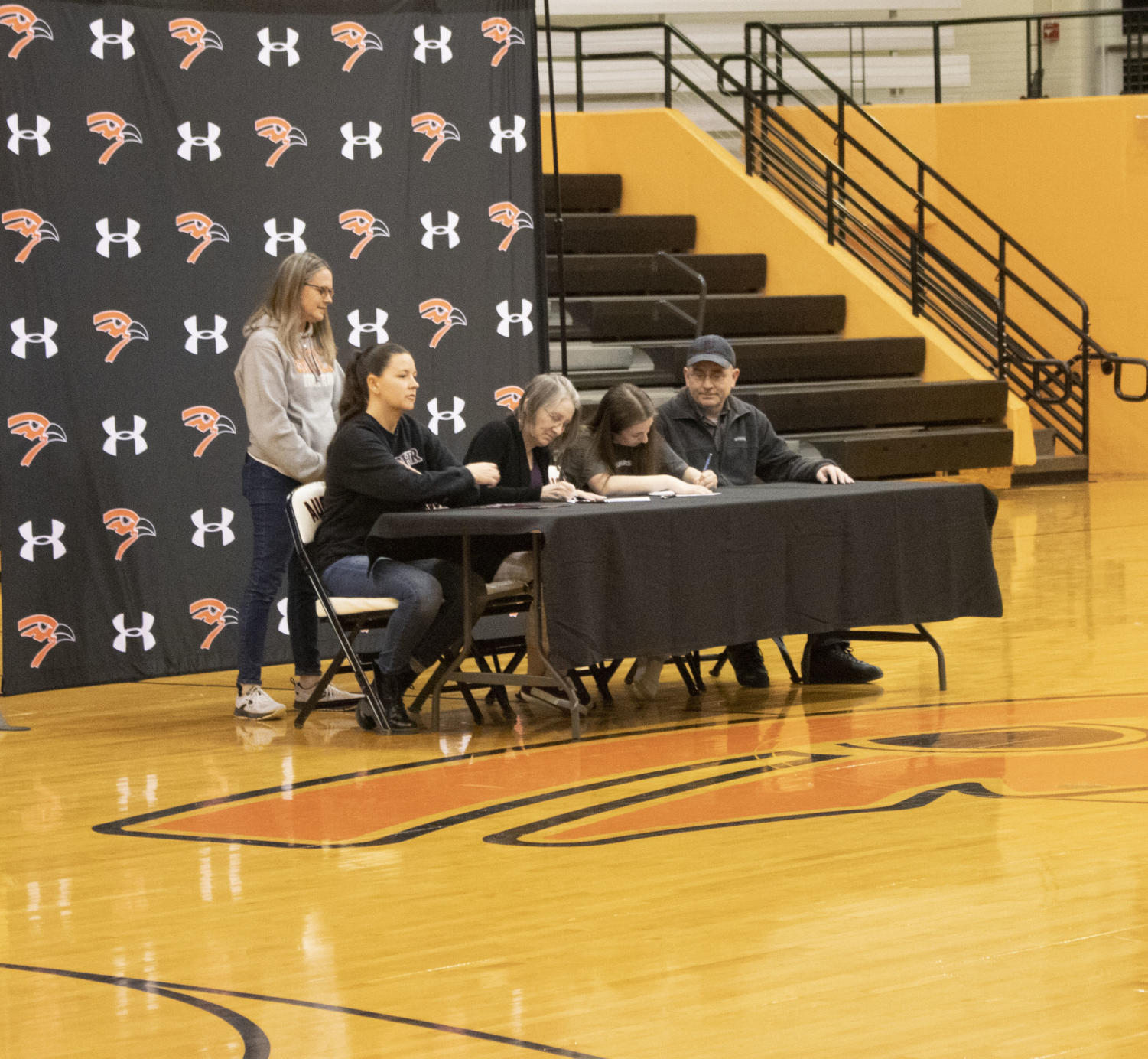 Seniors participate in college spring sports signing