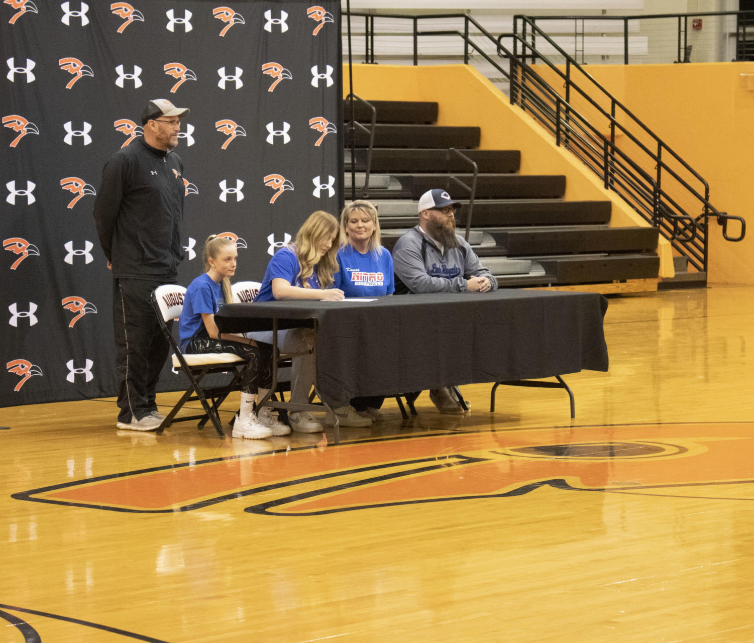 Seniors participate in college spring sports signing