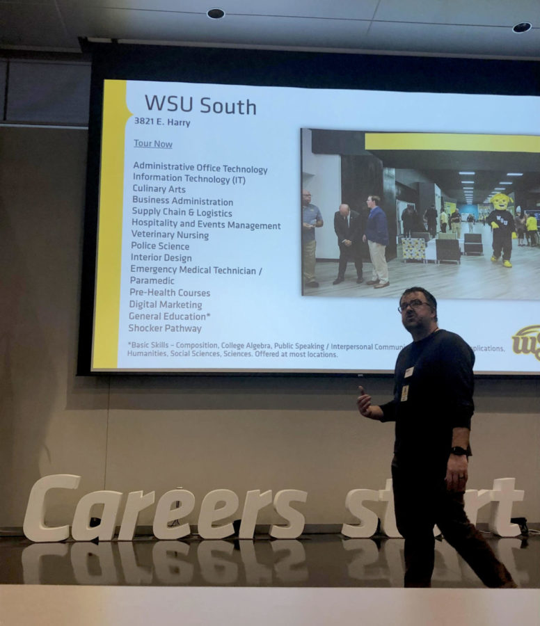 Assistant Director, College Access Cody Griffin, giving a speech about the programs and opportunities that come with WSU Tech. Griffin and other adults gave a group of students a tour around WSU Tech and showed them what it was like to be in the different classes.