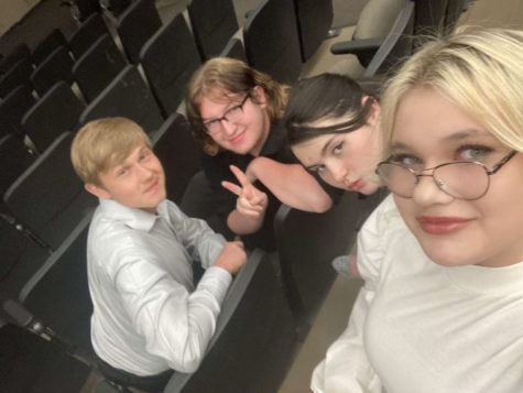Members of the forensics team, sophomores Devon Stamback and Sophe Rhodes and juniors Alex Evans and Pashence Adkins, wait for the National Speech and Debate Association (NSDA) forensics tournament to start. Adkins took 4th in her Dramatic Interpretation event and 6th in Humorous Interpretation event. 