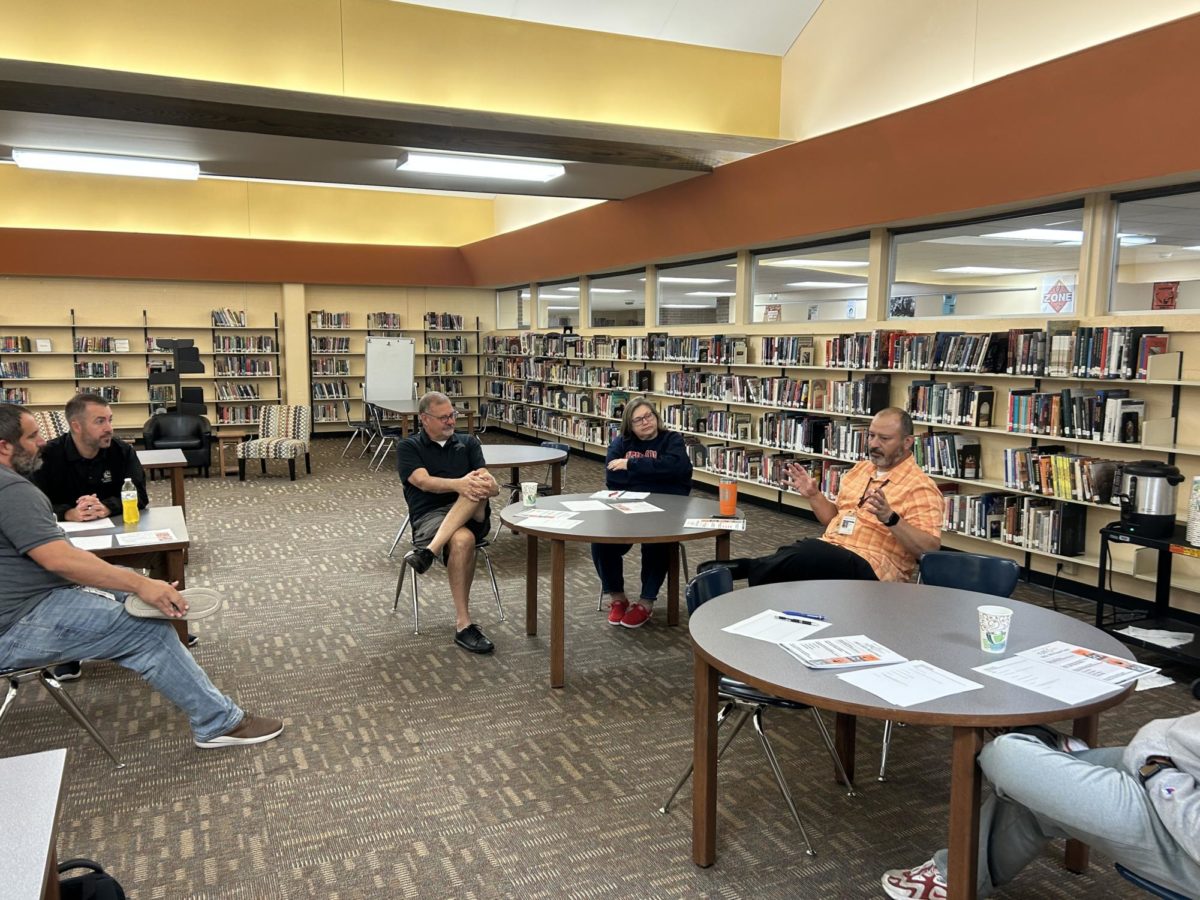 Principal+Rick+Rivera+and+assistant+principal+TJ+Meyer+host+the+first+coffee+with+the+principals+in+the+library%2C+discussing+with+teachers%2C+parents%2C+students+and+community+members+their+goals+and+plans+for+the+school+Sept.+20%2C+with+7+people+in+attendance.+This+event+is+just+one+of+the+many+ways+Rivera+and+Meyer+make+the+school+a+more+open+and+welcoming+place.+