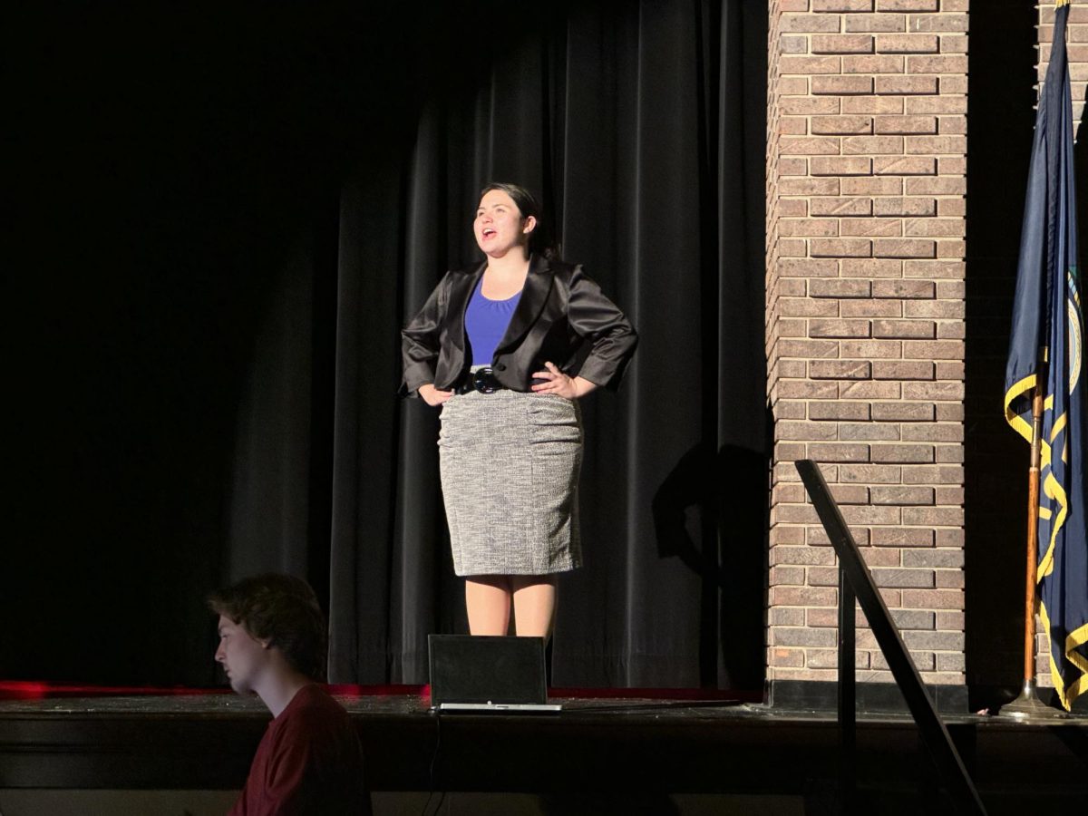 Senior Pashence Atkins performs the first song of the musical. Atkins plays the role of Principal Delila Strict in the production.      