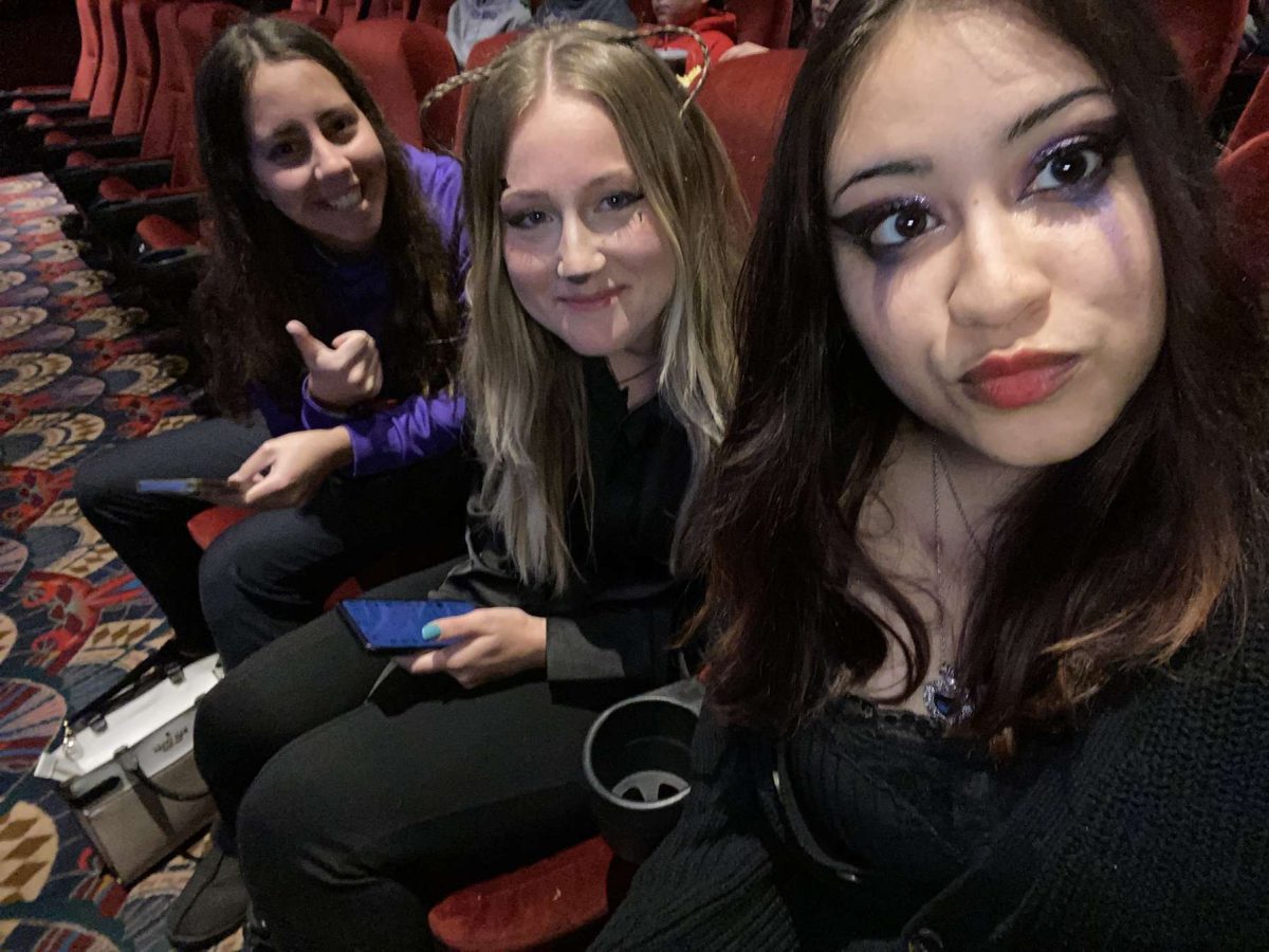 Seniors Lizzy Priddy, Lauren Howard and Giselle Mestas wait for the film to start at the opening of Five Nights at Freddy’s. Mestas also saw The Super Mario Bros. Movie in theaters on their opening nights.