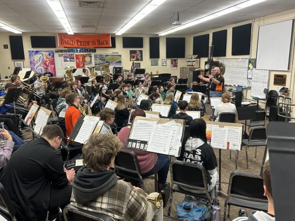 Band director James Hollingsworth and the band practice the piece “Of Days Gone By” for their upcoming competitions and performances. This is one of the pieces chosen to be played for their performance in the Music in the Park Festival.