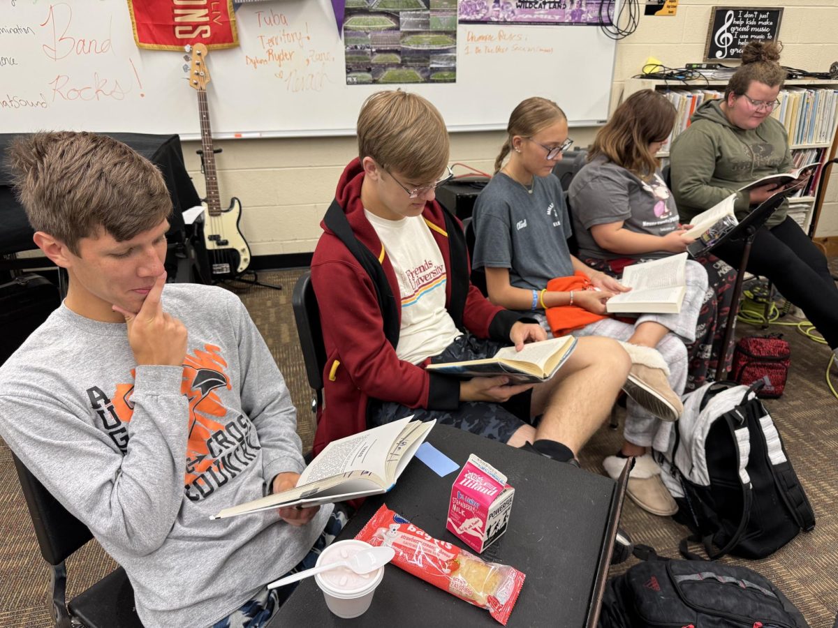 Seniors Zane Basler, Andy Bunck, Josie Jones, Abby Martiney and Navaeh Smith read their books during WINN time. These students read a book that they chose.
