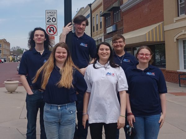 The Senior JAG class, Isaac Burnett, Zeke Firestine, Logan Hicks, Madison WIlliams, Floyd Mestas and Allysa Pierce pose for a picture outside of Sugar Shane’s Bar and Grill. Sugar Shane’s was the location of the business meeting that took place.
