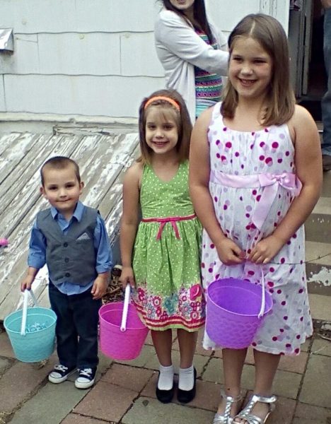 Younger cousin Wyatt Russell, Abigail Brinkley and Emily Brinkley get ready to look for eggs on easter morning with their younger cousin Wyatt Russell. They all enjoy getting up early to see what the easter bunny brought for them.