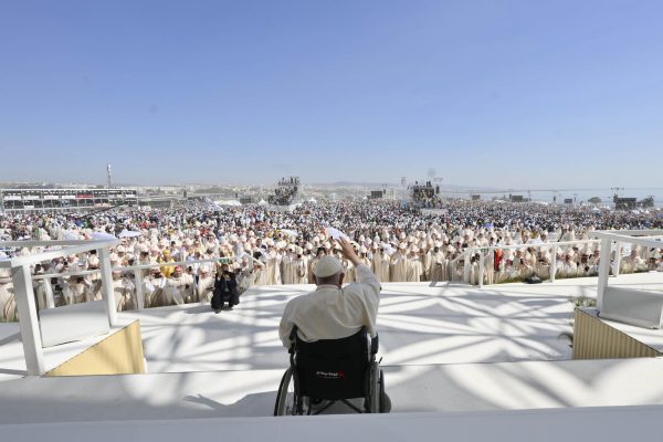Pope Francis waves to the congregation at the end of the closing mass for World Youth Day 2023. Over 1.5 million people attended the event despite the weather being over 100 degrees.
