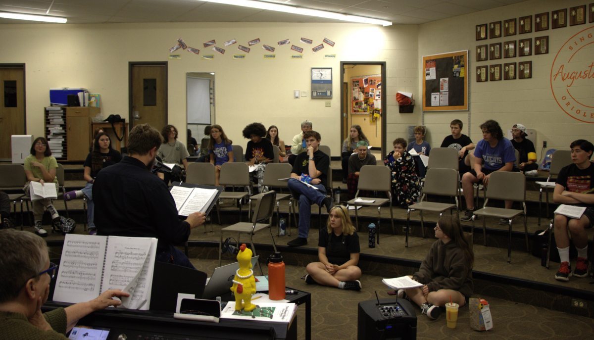 Director Nicholas Franssen helps the cast of “Once Upon a Mattress” with the pacing of the song “Opening For a Princess.” The song has a fast tempo and during the first rehearsal the cast struggled to keep up with the pace.