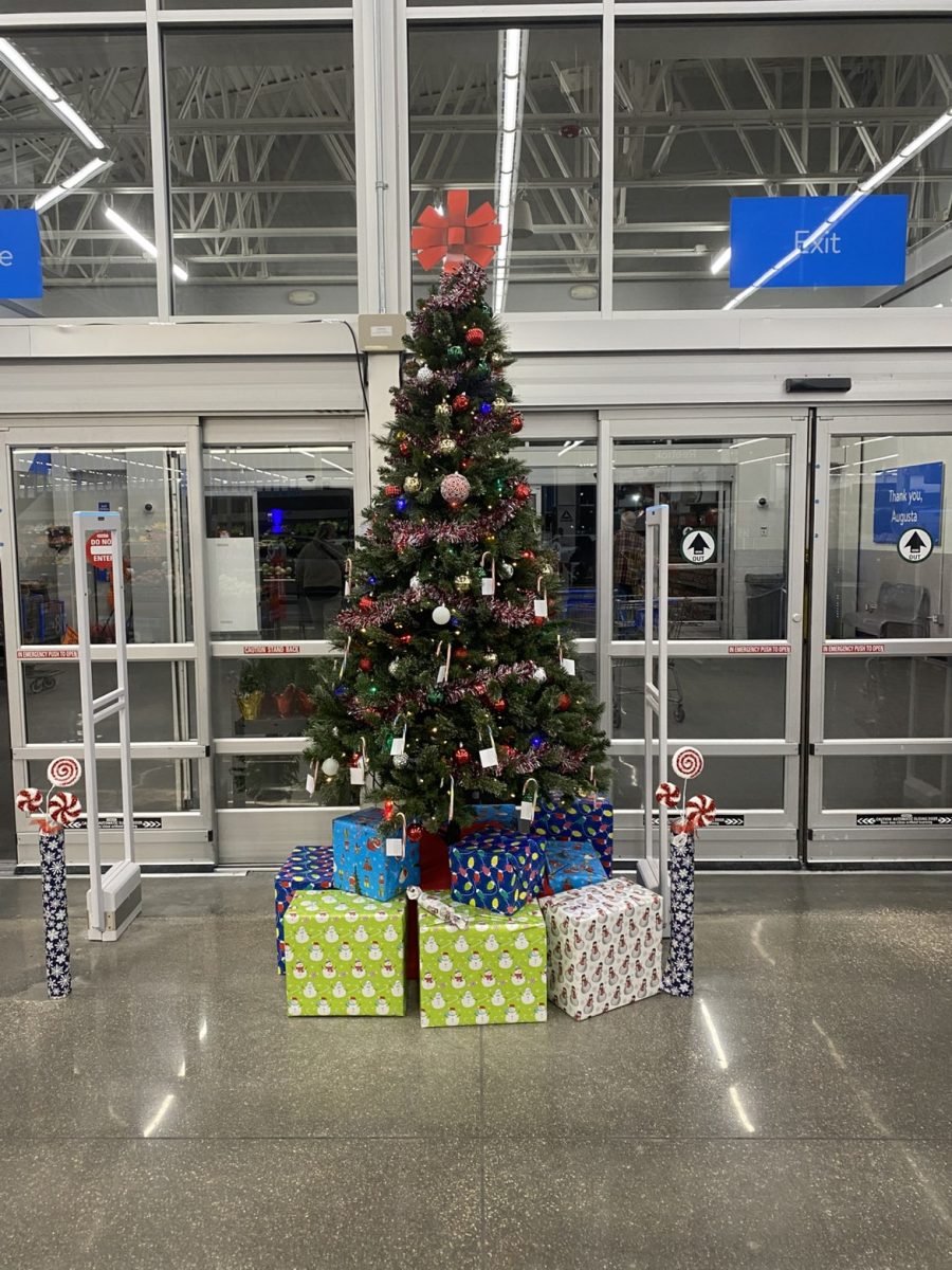 The angel tree in Walmart sits empty after the residents quickly took the ornaments. More gifts were purchased early in the holiday season than in previous years.         