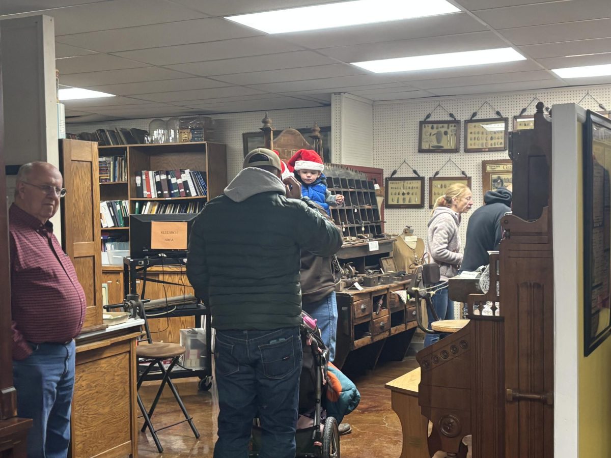 Parents and children wait in line to meet Santa Dec. 2. at Augusta Historical Museum. The Christmas parade has been around for at least 10 years
