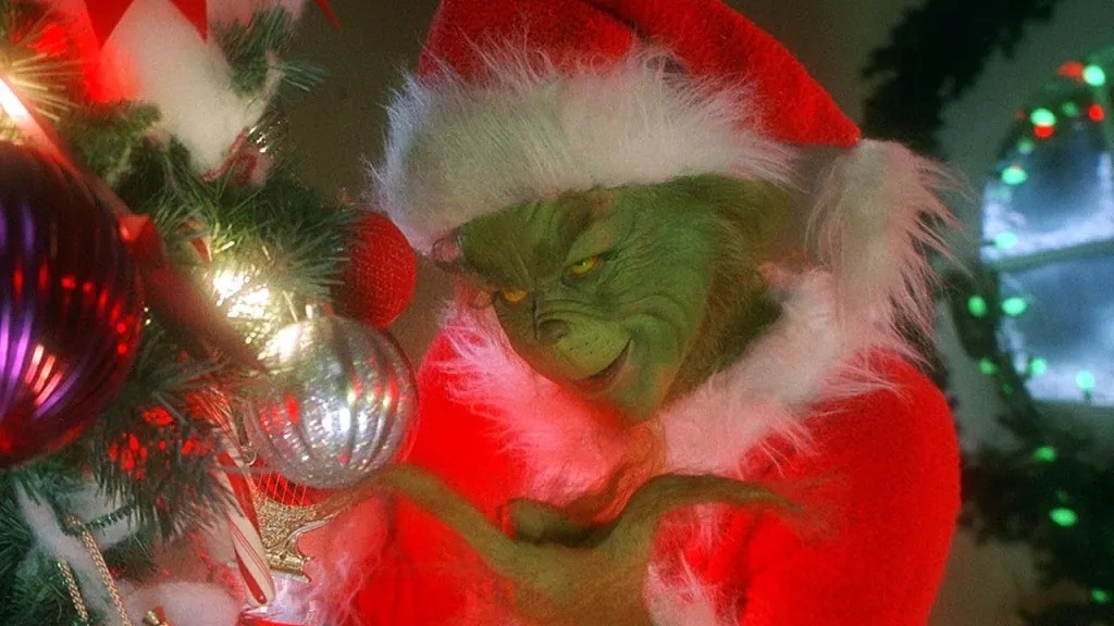 The Grinch examines ornaments on a Christmas tree before stealing them. “How the Grinch Stole Christmas” won the Academy Award for Best Makeup & Hairstyling, and was nominated for two other awards at the 73rd Oscars in 2000.
